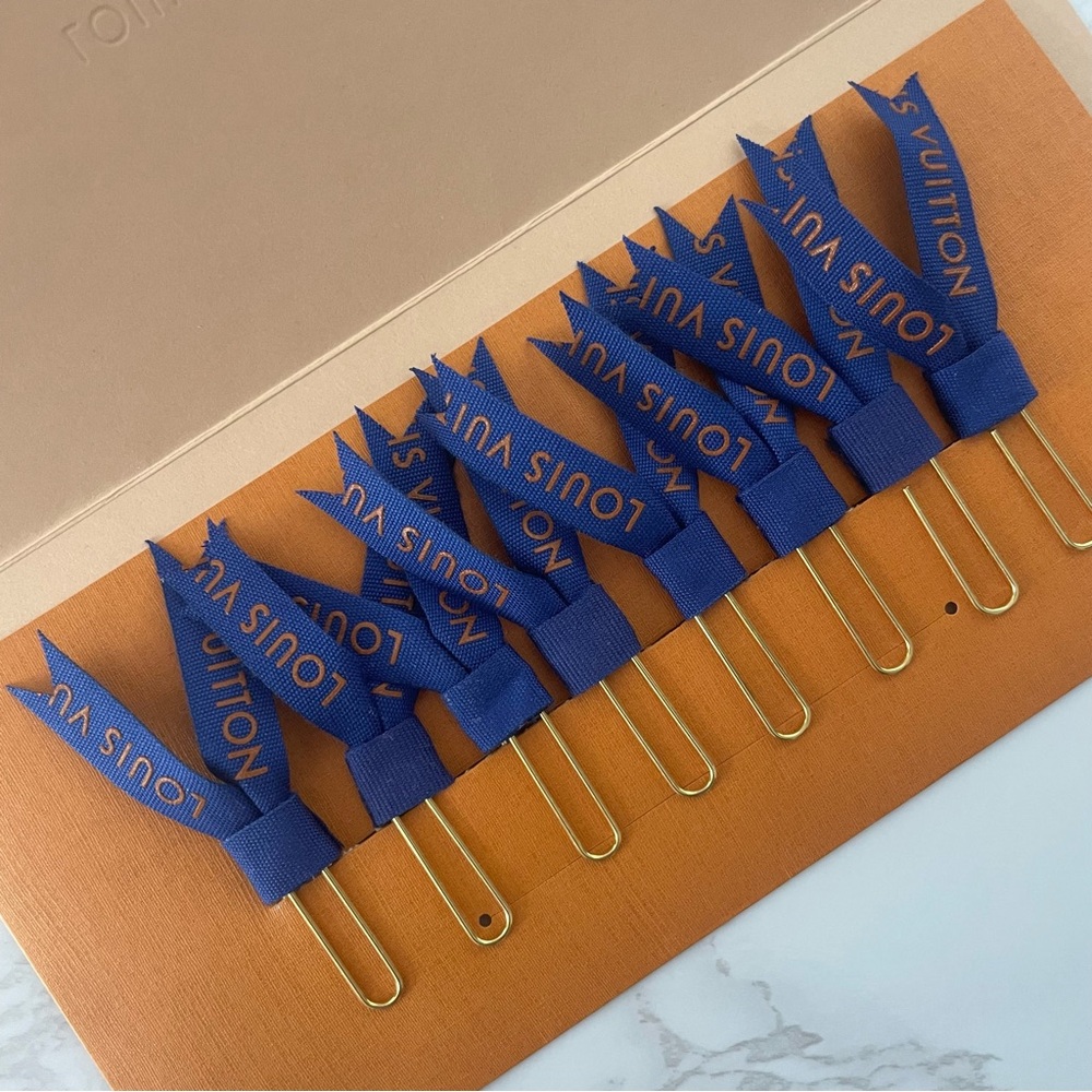 Upcycled reimaged and redesigned authentic LV ribbon clips